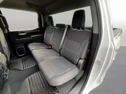 Chevrolet Silverado 1500 LT 4WD Crew Cab 147" 2026 — side view