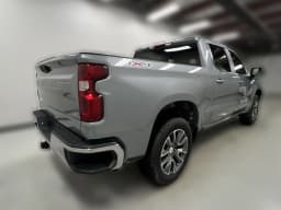 Chevrolet Silverado 1500 LT 4WD Crew Cab 147" 2026 — side view