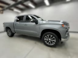 Chevrolet Silverado 1500 LT 4WD Crew Cab 147" 2026 — side view