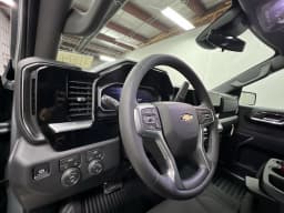 Chevrolet Silverado 1500 LT 4WD Crew Cab 147" 2026 — side view