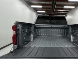 Chevrolet Silverado 1500 LT 4WD Crew Cab 147" 2026 — side view