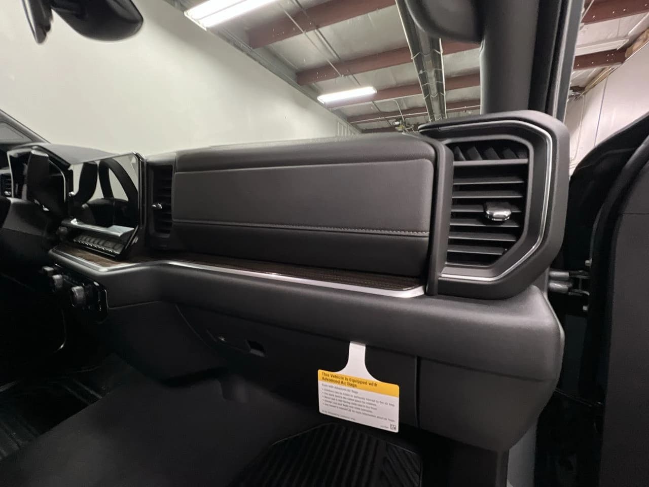 Chevrolet Silverado 1500 LT 4WD Crew Cab 147" 2026 — side view