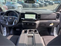 Chevrolet Silverado 1500 LT 4WD Crew Cab 147" 2026 — side view