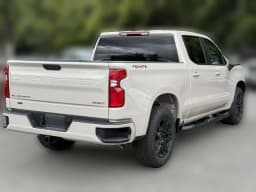 Chevrolet Silverado 1500 RST 4WD Crew Cab 147" 2026 — side view