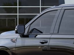 GMC Yukon AT4 4WD 4dr 2026 — side view