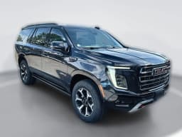 GMC Yukon AT4 4WD 4dr 2026 — side view