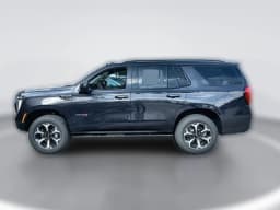 GMC Yukon AT4 4WD 4dr 2026 — side view