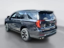 GMC Yukon AT4 4WD 4dr 2026 — side view