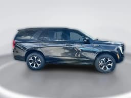 GMC Yukon AT4 4WD 4dr 2026 — side view