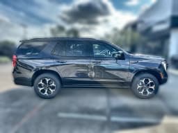 GMC Yukon AT4 4WD 4dr 2026 — side view