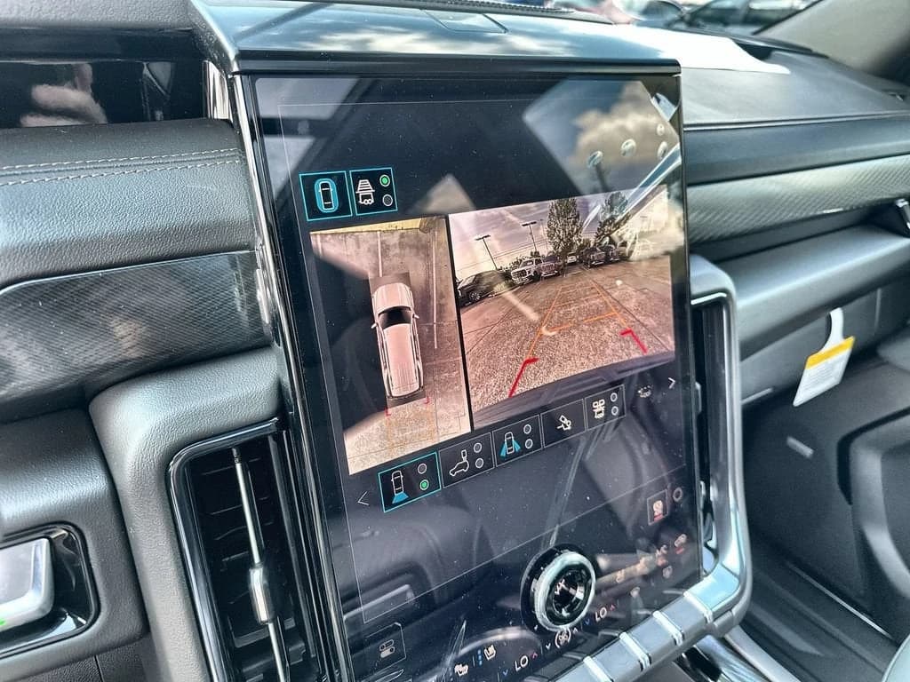 GMC Yukon AT4 4WD 4dr 2026 — side view