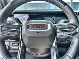 GMC Yukon AT4 4WD 4dr 2026 — side view