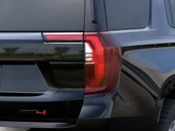 GMC Yukon AT4 4WD 4dr 2026 — side view