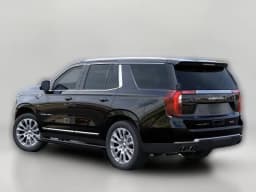 GMC Yukon Denali 4WD 4dr 2026 — side view