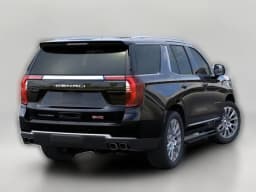 GMC Yukon Denali 4WD 4dr 2026 — side view
