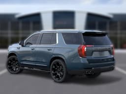 GMC Yukon Denali Ultimate 4WD 4dr 2026 — side view