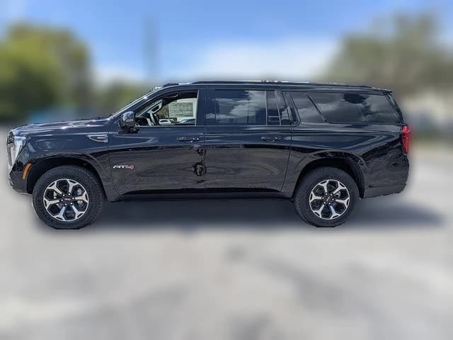 GMC Yukon XL AT4 4WD 4dr 2026 — side view