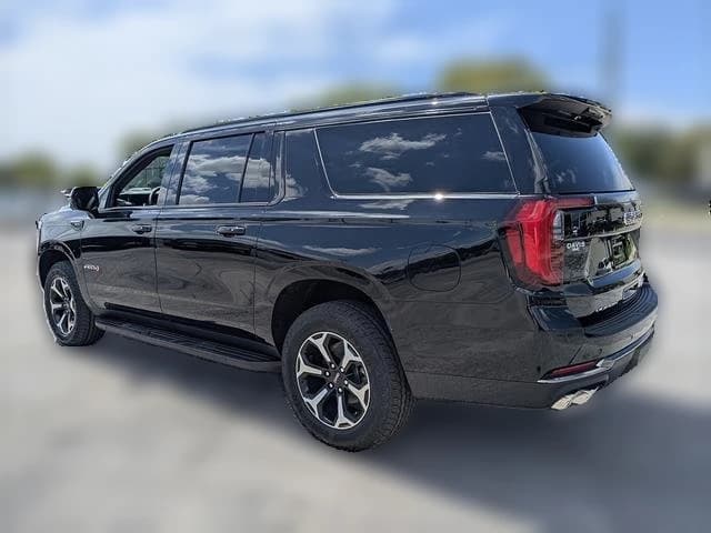 GMC Yukon XL AT4 4WD 4dr 2026 — side view
