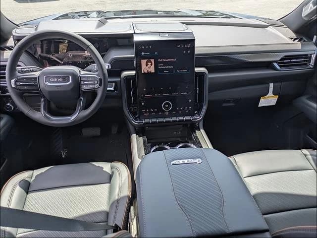 GMC Yukon XL AT4 4WD 4dr 2026 — side view