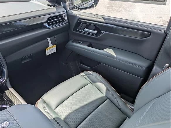 GMC Yukon XL AT4 4WD 4dr 2026 — side view
