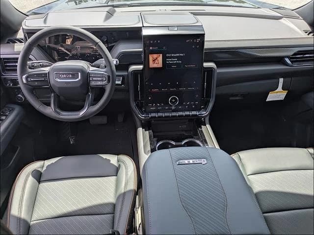 GMC Yukon XL AT4 4WD 4dr 2026 — side view