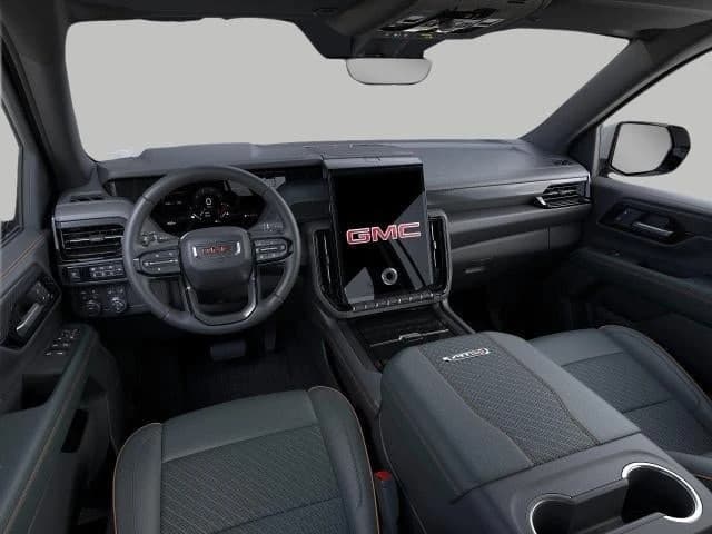 GMC Yukon XL AT4 4WD 4dr 2026 — side view