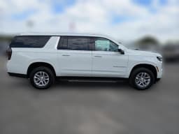 Chevrolet Suburban LS 2WD 4dr 2026 — side view