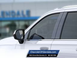 Chevrolet Suburban LS 2WD 4dr 2027 — side view