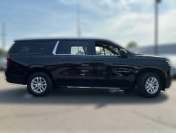 Chevrolet Suburban LS 4WD 4dr 2026 — side view