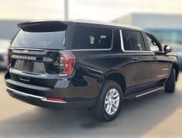 Chevrolet Suburban LS 4WD 4dr 2026 — side view