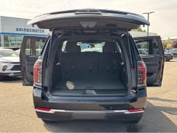 Chevrolet Suburban LS 4WD 4dr 2026 — side view