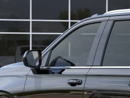 Chevrolet Suburban LS 4WD 4dr 2026 — side view