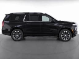 Chevrolet Suburban LS 4WD 4dr 2027 — side view