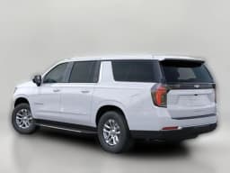 Chevrolet Suburban LS 4WD 4dr 2026 — side view