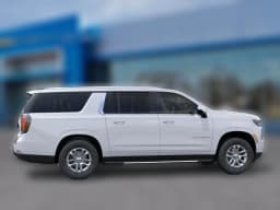 Chevrolet Suburban LS 4WD 4dr 2026 — side view