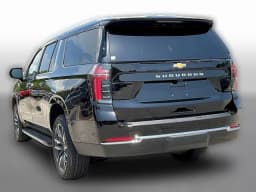 Chevrolet Suburban LS 4WD 4dr 2026 — side view