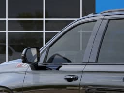 Chevrolet Suburban Z71 4WD 4dr 2027 — side view