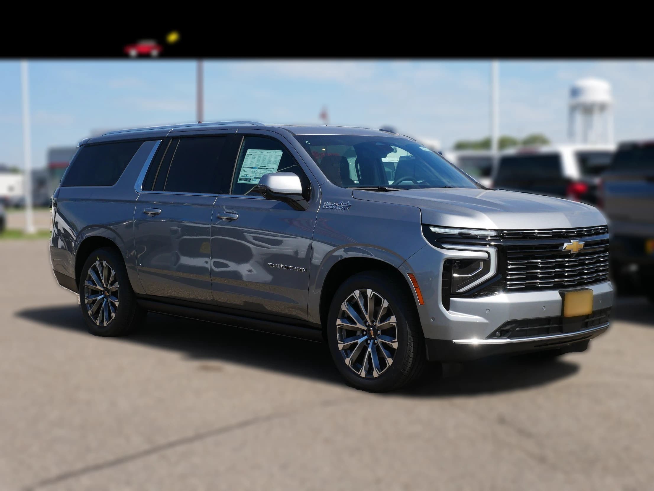 Chevrolet Suburban High Country 4WD 4dr 2026 — side view