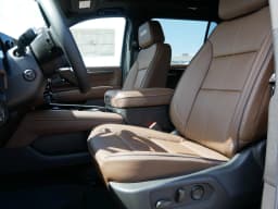 Chevrolet Suburban High Country 4WD 4dr 2026 — side view