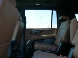 Chevrolet Suburban High Country 4WD 4dr 2026 — side view