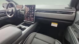 GMC Sierra EV Standard Range Elevation e4WD Crew Cab 2026 — side view