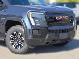 GMC Sierra EV Standard Range Elevation e4WD Crew Cab 2026 — side view