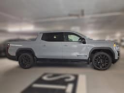 GMC Sierra EV Standard Range Elevation e4WD Crew Cab 2026 — side view
