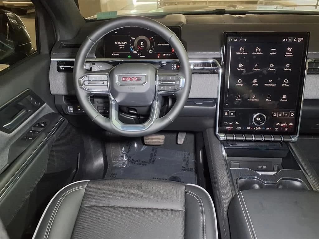 GMC Sierra EV Standard Range Elevation e4WD Crew Cab 2026 — side view