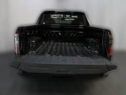 GMC Sierra EV Extended Range Elevation e4WD Crew Cab 2026 — side view