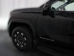 GMC Sierra EV Extended Range Elevation e4WD Crew Cab 2026 — side view