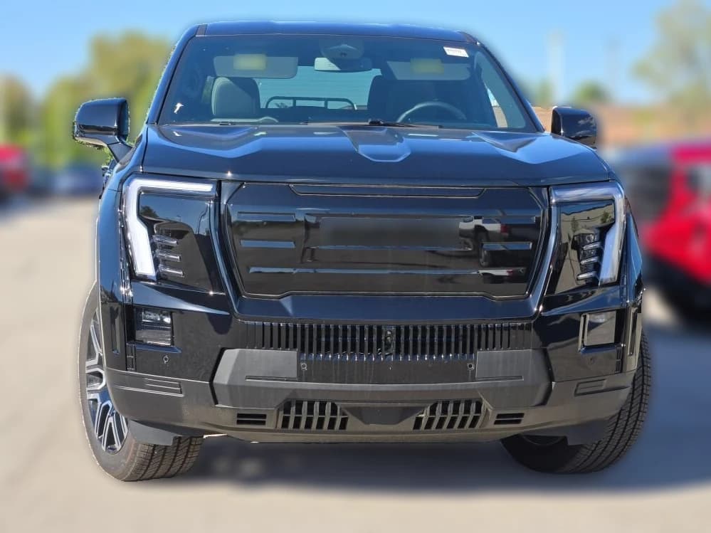 GMC Sierra EV Extended Range Elevation e4WD Crew Cab 2026 — side view