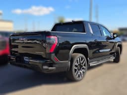 GMC Sierra EV Extended Range Elevation e4WD Crew Cab 2026 — side view