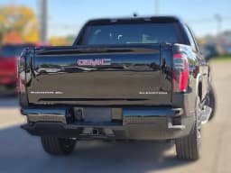 GMC Sierra EV Extended Range Elevation e4WD Crew Cab 2026 — side view