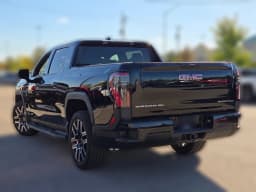 GMC Sierra EV Extended Range Elevation e4WD Crew Cab 2026 — side view